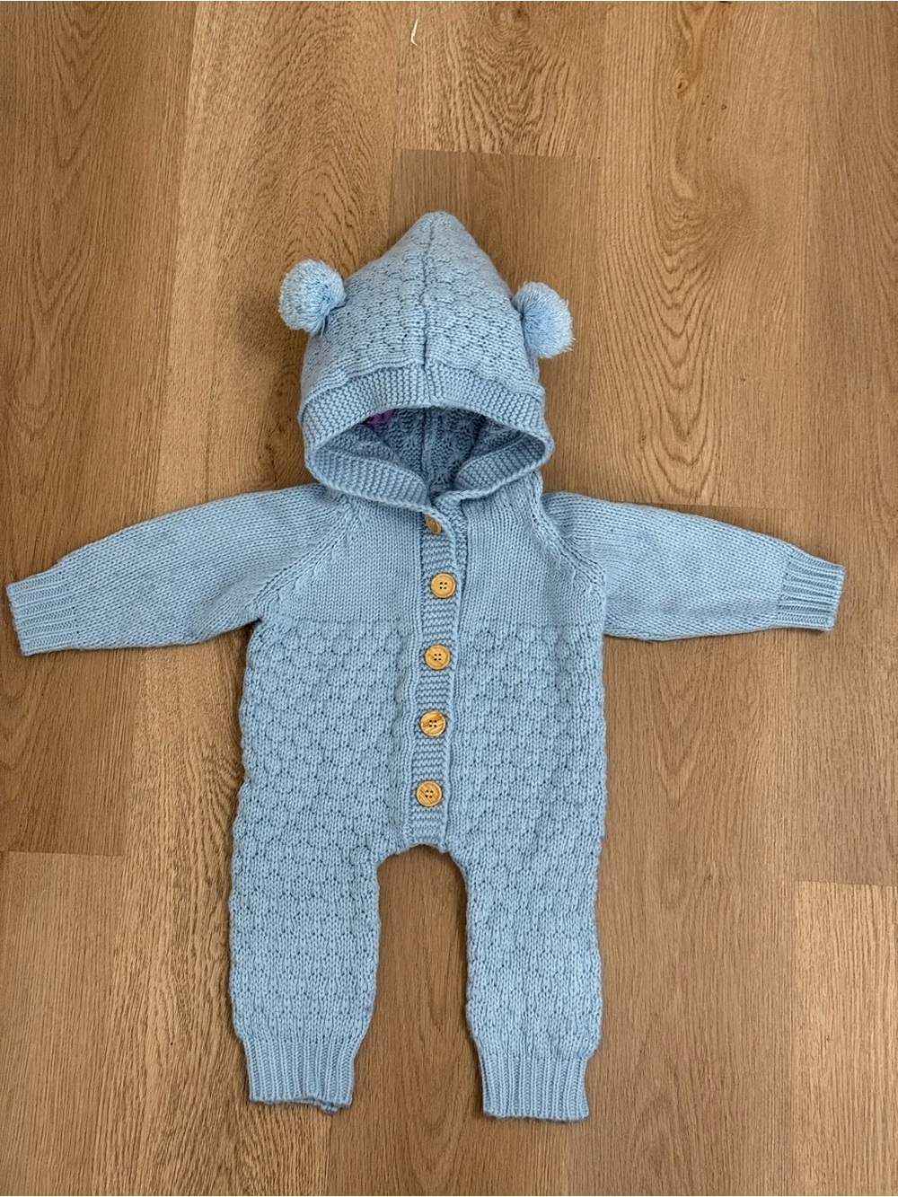 Baby Hooded Knit One-Piece in Light Blue with Pom Details